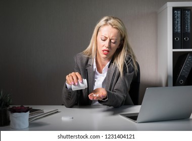 Woman Taking Drugs At Work