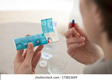 Woman Taking Medication