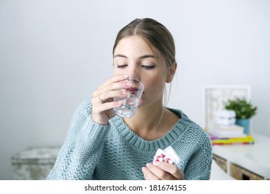 Woman Taking Medication