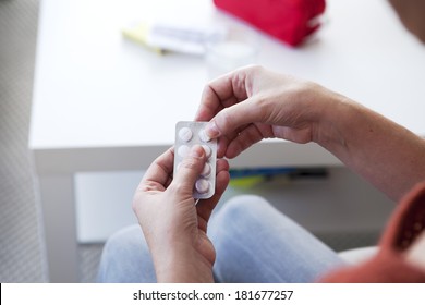 Woman Taking Medication