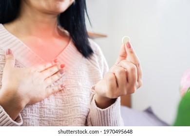 Woman Taking Medicine For GERD, Having Problem With Heartburn From Acid Reflux Disease, Discomfort Caused By Stomach Bloating