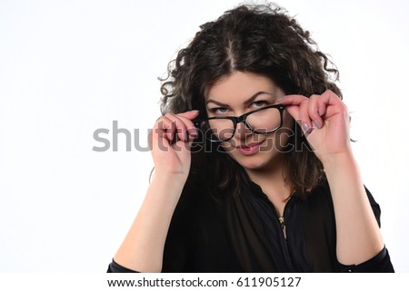 woman taking off her eye glasses. isolated