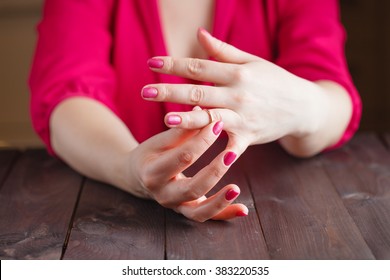 Woman Is Taking Off The Wedding Ring