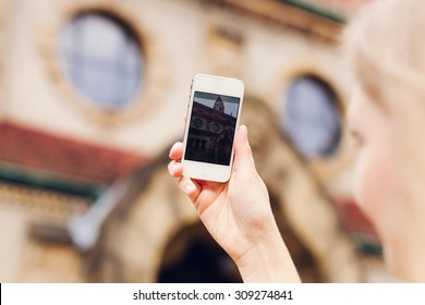 Woman taking picture with smartphone - Shutterstock ID 309274841