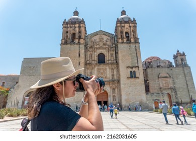 Woman Taking Pictures In Oaxaca City