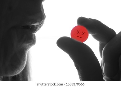Woman Is Taking Red Pill. Poison Concept