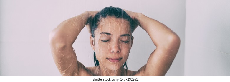 Woman Taking Relaxing Hot Shower At Home Washing Hair Happy Wellness Care Panoramic Banner.