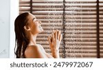 Woman Taking Shower Enjoying Water Splashing On Her, Side View