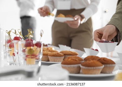 Woman Taking Snack During Coffee Break, Closeup