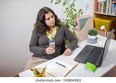 Woman Taking Training Course In Mental Care And Writing Down List Of Rules For Mental Health To Reduce Stress From Distant Job During Lockdown, New Normal Reality, Social Distant Working, Lifestyle