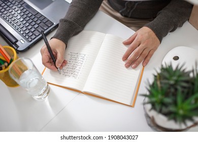 Woman Taking Training Course In Mental Care And Writing Down List Of Rules For Mental Health To Reduce Stress From Distant Job During Lockdown, New Normal Reality, Social Distant Working, Lifestyle