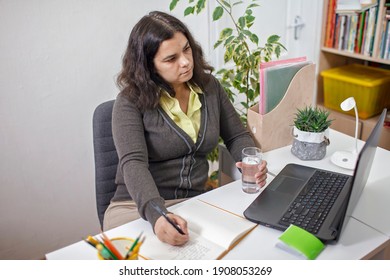 Woman Taking Training Course In Mental Care And Writing Down List Of Rules For Mental Health To Reduce Stress From Distant Job During Lockdown, New Normal Reality, Social Distant Working, Lifestyle