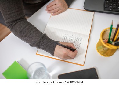 Woman Taking Training Course In Mental Care And Writing Down List Of Rules For Mental Health To Reduce Stress From Distant Job During Lockdown, New Normal Reality, Social Distant Working, Lifestyle