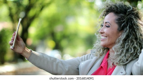Woman Talking On Cellphone Camera Outside Remotely On Webcam