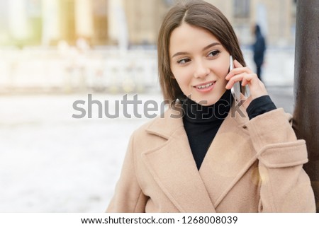 Woman Talking On Phone Walking On The Street. Portrait Of Stylish Smiling Business Woman In Winter Clothes Calling On Mobile Phone. Female Winter Style. - Image