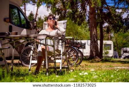 Similar – Image, Stock Photo Woman walking up ladder to tent over car