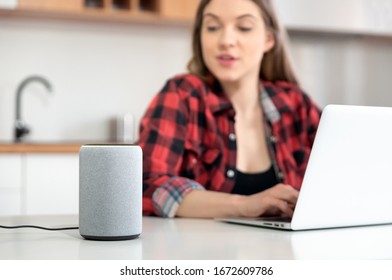 Woman Talking To Smart Speaker. Intelligent Assistant In Smart Home System.