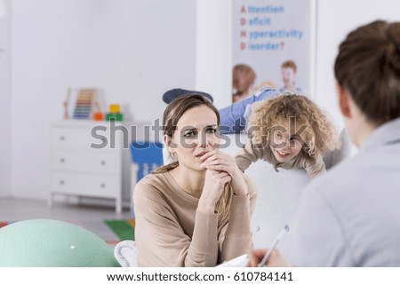 Woman talking with therapist about her child
