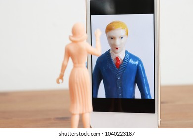 Woman Talks To Strange Man On The Phone. Communication Through Phones Or Dating Aps. Online Relationships Between Men And Women Using Technology.  Demanding Boss Or Needy Boyfriend.