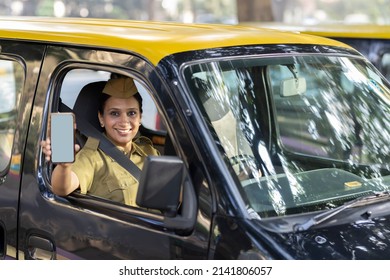 Woman Taxi Driver Showing Mobile Phone Screen
