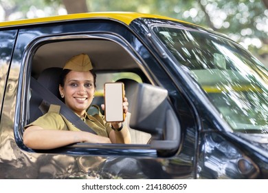 Woman Taxi Driver Showing Mobile Phone Screen
