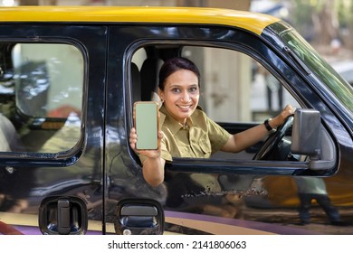 Woman Taxi Driver Showing Mobile Phone Screen
