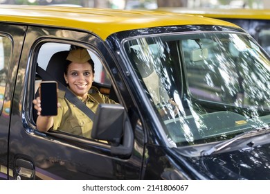 Woman Taxi Driver Showing Mobile Phone Screen
