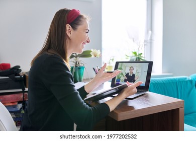 Woman Teacher Teaching Student Teenager Online Using Video Call On Laptop