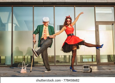 Woman Teaches The Old Man To Dance, The Pensioner Repeats The Movements Of The Dance.