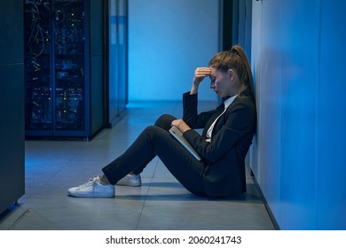 Woman Technician Feeling Pressure In Server Room