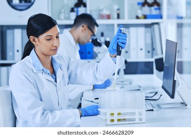 Woman, technician and medical research for covid 19, vaccine and pipette with sample in lab for pharmaceuticals. Female person, scientist and virus in healthcare for chemistry in forensic for testing - Powered by Shutterstock