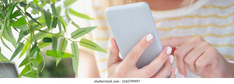 Woman Texting On Mobile Phone Or Playing Online Game To Kill Time