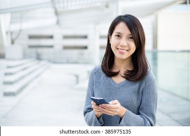 Woman texting on phone 