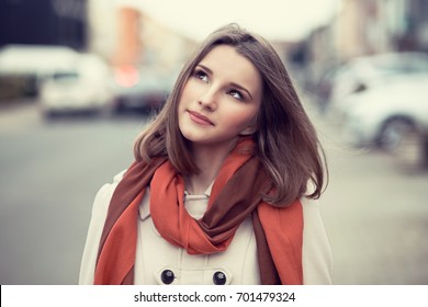 Woman Thinking. Daydream. Closeup Portrait Young Lady Girl Looking Up Trying To Remember, Recall Information Isolated Cityscape Outdoor Background. Multicultural Mixed Race. Positive Face Expression