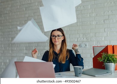 Woman Is Throwing Papers Ahead. She Is Done With Work