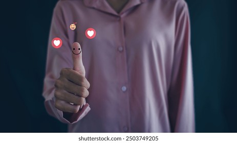 woman thumbs up showing happy smiley face and red heart emoticon, think positive, customer review, assessment, good mood, world mental health day. - Powered by Shutterstock