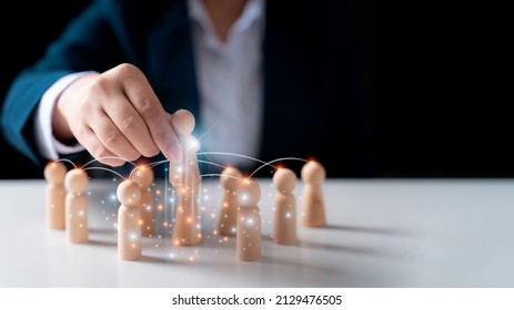 woman touch wooden Human resources officer looking for leader and CEO concept, Leader leave his comfort zone and get out of the crowd. Personal development, motivation and challenge. - Shutterstock ID 2129476505