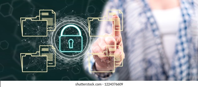 Woman touching a data security concept on a touch screen with her finger