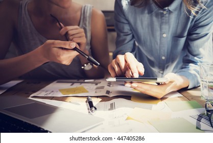 Woman Touching Display Digital Tablet Hand.Project Manager Researching Process.Business Team Working Startup modern Coworking.Analyze market stock.Using electronic device,paper,note wood table.Blurred - Powered by Shutterstock