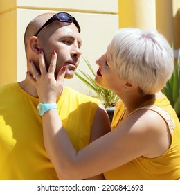 Woman Touching Her Man's Face With Her Hand