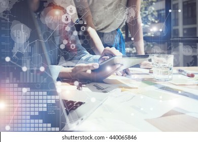 Woman Touching Screen Electronic Tablet Hand.Project Managers Researching Process.Business Team Working New Startup modern Office.International Digital Diagrams Interfaces.Analyze market stock.Blurred - Powered by Shutterstock