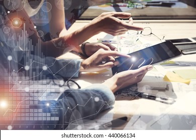 Woman Touching Screen Electronic Tablet Hand.Project Managers Researching Process.Business Team Working New Startup modern Office.International Digital Charts Interfaces.Analyze market stock.Blurred - Powered by Shutterstock