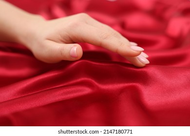 Woman Touching Smooth Silky Fabric, Closeup View