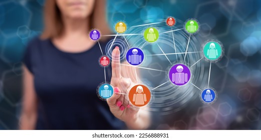 Woman touching a social network concept on a touch screen with her finger - Shutterstock ID 2256888931