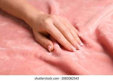 Woman Touching Soft Pink Fabric, Closeup View