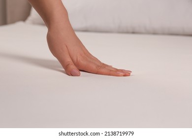 Woman Touching Soft White Bedsheet, Closeup View