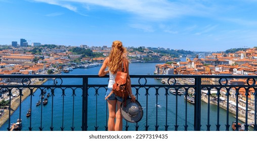 Woman tourist admiring panoramic view of cityscape of Porto- tour tourism in Portugal, Travel in Europa - Shutterstock ID 2297319435