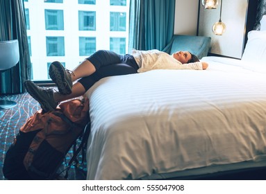 Woman Tourist Backpacker Relax In High Quality Hotel Room