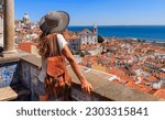 Woman tourist enjoying panoramic view of Lisbon city landscape- Portugal