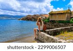 Woman tourist in Galicia,  Combarro, Pontevedra in Spain